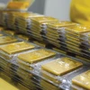 Domestic gold prices have surged, even topping 90 million VND (over 3,500 USD) per tael. (Photo: tapchicongthuong.vn)