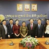 Vietnamese Deputy Minister of Culture, Sports and Tourism Ta Quang Dong (fourth from right), Cambodian Minister of Culture and Fine Arts Phoeurng Sackona (fifth from right), and other officials at the meeting in Phnom Penh on May 21. (Photo: VNA)