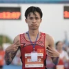 Nguyen Trung Cuong takes the gold in the men's 5,000m event at the Taiwan Athletics Open on June 2 in Chinese Taipei. (Photo: 24h.com.vn)