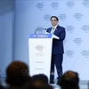 PM Pham Minh Chinh addresses the plenary session of the WEF’s 15th Annual Meeting of the New Champions took place in Dalian, China, on June 25. (Photo: VNA)
