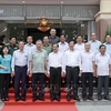 President To Lam (front, fourth from left) and officials of An Giang province in a group photo on July 6. (Photo: VNA)