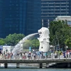 Visitors to Marina Bay of Singapore (Photo: AFP/VNA)