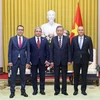 President To Lam (second, right) and Ambassadors Korhan Kemik of Türkiye (first, left), Shovgi Kamal Oglu Mehdizade of Azerbaijan (second, left), and Kanat Tumysh of Kazakhstan (first, right) at the meeting in Hanoi on July 16 (Photo: VNA)