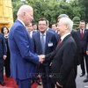 Party General Secretary Nguyen Phu Trong (R) welcomes US President Joe Biden, who is on a state visit to Vietnam, on September 10, 2023. (Photo: VNA)