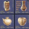 The new stamps feature the Dau Ram ceramic vase, the collection of Long Thanh terracotta vases, the Nhon Thanh ceramic vase, and the brown-flower ceramic jar. (Photo: Vietnam Post )