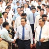 NA Chairman Tran Thanh Man (front, second from right) and delegates to the conference announcing the NA Standing Committee’s Resolution 1104/NQ-UBTVQH15 in Nam Dinh province on August 10. (Photo: VNA)