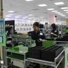 Workers at the factory of the Samsung Electronics Vietnam Co. Ltd in Yen Phong district, Bac Ninh province. (Photo: VNA)