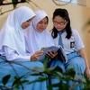 Indonesia to expand free schooling for poor students at private schools