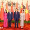 General Secretary of the Communist Party of Vietnam Central Committee and President of Vietnam To Lam (second from left) and his spouse in a joint photo with General Secretary of the Communist Party of China Central Committee and President of China Xi Jinping and his spouse in Beijing on August 19. (Photo: VNA)