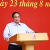 PM Pham Minh Chinh addresses the third meeting of the 14th National Party Congress's sub-committee for socioeconomic affairs on August 23. (Photo: VNA)