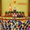 Le Minh Tri takes an oath after being elected Chief Justice of the Supreme People’s Court on August 26. (Photo: VNA)