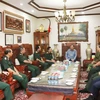 Officials of the General Department of Politics of the Vietnam People’s Army visit former General Secretary of the Lao People’s Revolutionary Party and President of Laos Bounnhang Vorachith on August 27. (Photo: VNA)