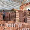 Bricks produced at Vien Chau Construction Material Production Joint Stock Company. Prime Minister Pham Minh Chinh has issued a directive on solutions to promote production and consumption of building materials. (Photo: VNA) 