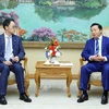 Deputy PM Tran Hong Ha (right) receives CCCC Executive Director Wang Haihuai in Hanoi on August 28. (Photo: VNA)