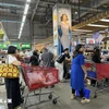 Indonesian people shop at the Grand Lucky supermarket. (Photo: VNA)