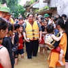 PM Pham Minh Chinh visits residents in flood-hit Van Ha commune of Viet Yen township, Bac Giang province, on September 10. (Photo: VNA)