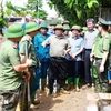 PM Pham Minh Chinh examines the settlement of downpour and flooding consequences in Yen Bai city, Yen Bai province, on September 12. (Photo: VNA)