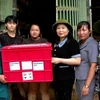 Relief from the Australian Embassy is presented to typhoon-hit residents in Hong Ha ward of Yen Bai city, Yen Bai province, on September 13. (Photo: VNA)