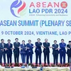 Vietnamese PM Pham Minh Chinh (fifth from left) and other heads of delegations pose for a group photo at the 44th ASEAN Summit in Vientiane on October 9. (Photo: VNA)