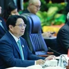 PM Pham Minh Chinh attends the 27th ASEAN - China Summit in Vientiane on October 10. (Photo: VNA)