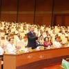 Party General Secretary and State President To Lam (standing) and other officials at the conference held on October 20 (Photo: VNA)