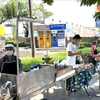 Vendors on a street in Bangkok, Thailand (Photo: VNA)