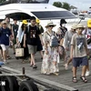 Visitors to Bali, Indonesia (Photo: AFP/VNA)