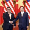 Chairman of the Vietnamese National Assembly Tran Thanh Man (right) and Speaker of the Malaysian House of Representatives Tan Sri Dato' Johari Bin Abdul in Hanoi on October 23. (Photo: VNA)