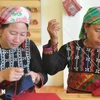 Xa Pho ethnic women work on brocade products in Nam Sai commune of Sa Pa township, Lao Cai province. (Photo: VNA)