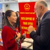 Tran Thu Quynh (left), trade counsellor of Vietnam in Canada, talks to Aref Salem, a Montreal City Councilor for Saint Laurent district, at the 2024 MIBIExpo. (Photo: VNA)