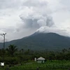 Ash spewed from Lewotobi Laki-Laki volcano seen in Pulolera village of Flores Timur district, East Nusa Tenggara province, Indonesia. (Photo: Xinhua/VNA)