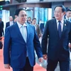 Vietnamese Prime Minister Pham Minh Chinh (left) and his Lao counterpart Sonexay Siphandone in Kunming city, China, on November 6. (Photo: VNA)