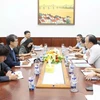 Officials of the Vietnam Directorate of Market Surveillance and the RoK side discuss measures for fighting counterfeits and intellectual property infringement. (Photo: VNA)