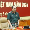 Le général de corps d'armée Phung Si Tan, chef d'état-major adjoint de l'Armée populaire du Vietnam, à la conférence. Photo: VNA