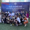L'équipe Xom remporte le titre de champion du tournoi de football d'été. Photo: VNA
