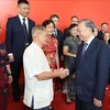 Le secrétaire général et président To Lam rencontre des délégués chinois. Photo: VNA