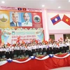 Des élèves à la rentrée scolaire de l'école bilingue Laos-Vietnam Nguyen Du. Photo: VNA