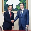 Le président de l'Assemblée nationale du Vietnam, Tran Thanh Man (droite), et le président du Parlement de Singapour, Seah Kian Peng. Photo: VNA