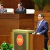 Le Premier ministre Pham Minh Chinh prononce un discours dans le cadre de la 8e session en cours de la 15e Assemblée nationale (AN), le 12 novembre. Photo: VNA