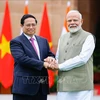 El premier de Vietnam, Pham Minh Chinh y su homólogo indio, Narendra Modi. (Fuente:VNA)