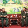  Chansamone Chanyalath, viceprimer ministro y titular de Defensa de Laos, recibe a Hoang Xuan Chien viceministro de Defensa de Vietnam. (Fuente: VNA)