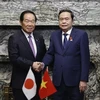 El presidente de la Asamblea Nacional de Vietnam, Tran Thanh Man, y el titular de la Cámara de Representantes de Japón, Nukaga Fukushiro. (Fuente: VNA)