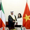 La viceministra de Relaciones Exteriores de Vietnam, Nguyen Minh Hang, y el ministro adjunto de Asuntos Exteriores para Asuntos de Asia, Sameeh Essa Johar Hayat. (Fuente: VNA)