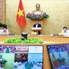 El primer ministro Pham Minh Chinh preside la reunión ordinaria del Gobierno correspondiente a junio de 2024. (Fuente: VNA)