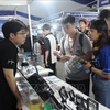 Las empresas promueven la inversión y el comercio en el Festival de Conexión de Inversión en Tecnología de Semiconductores de Hanoi 2024. (Fuente: VNA)