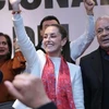 墨西哥总统克劳迪娅·谢因鲍姆（左）和墨西哥劳动党主席阿尔贝托·安纳亚·古铁雷斯。图自越通社