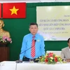 Le vice-président permanent de la Fédération du travail de Hô Chi Minh-Ville, Tran Doan Trung prend la parole. Photo: VNA