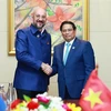 Le Premier ministre Pham Minh Chinh (droite) rencontre le président du Conseil européen Charles Michel. Photo: VNA