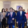 Le PM Pham Minh Chinh rencontre des représentants de la communauté vietnamienne au Qatar. Photo: VNA