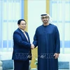 Le Premier ministre Pham Minh Chinh s'entretient avec le président des Émirats arabes unis (EAU), Mohamed ben Zayed Al Nahyan. Photo: VNA